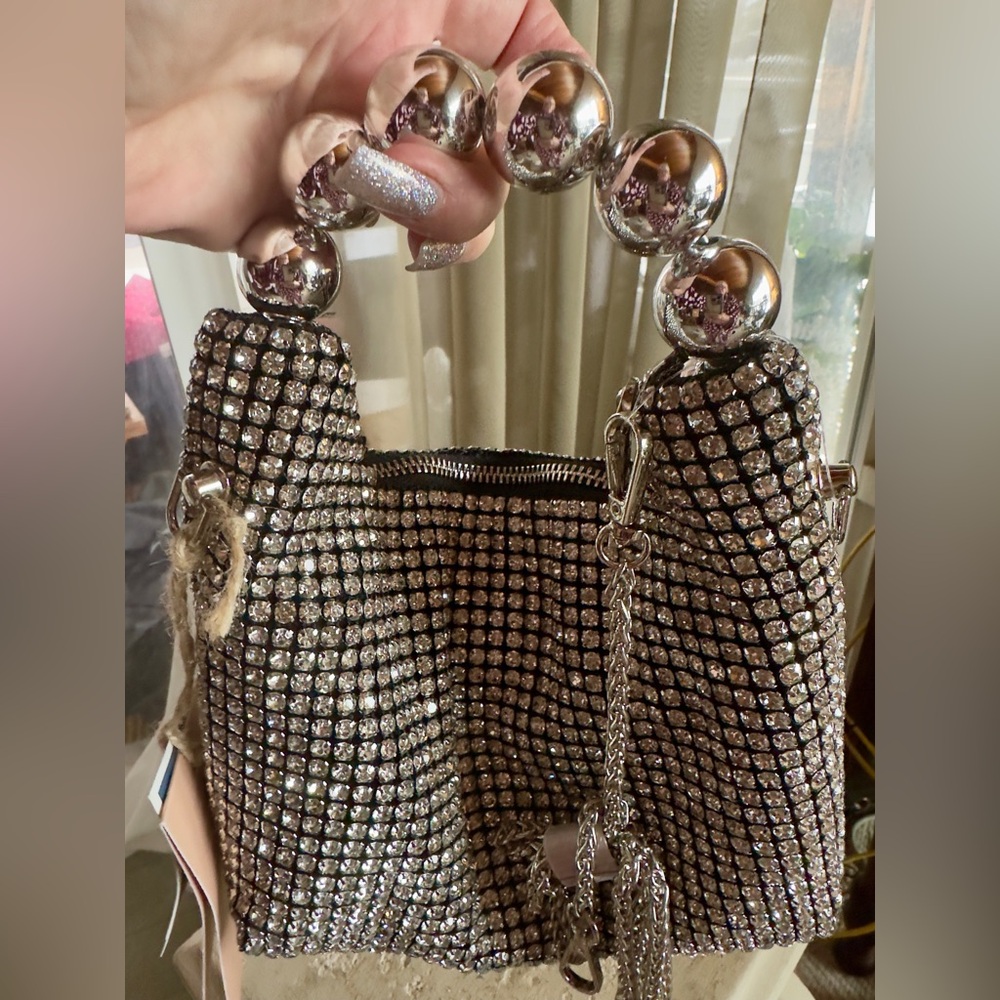 Elegant rhinestone and Silver Beaded handle clutch/crossbody by Expressions NYC.
